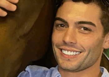 Trainer fined for punching brother