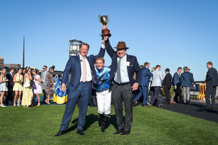 Calvin and Tony McEvoy with Jamie Melham after Half Yours won the Sportsbet Caulfield Cup at Caulfield Racecourse on October 18, 2025 in Caulfield, Australia. (Photo by Reg Ryan/Racing Photos)