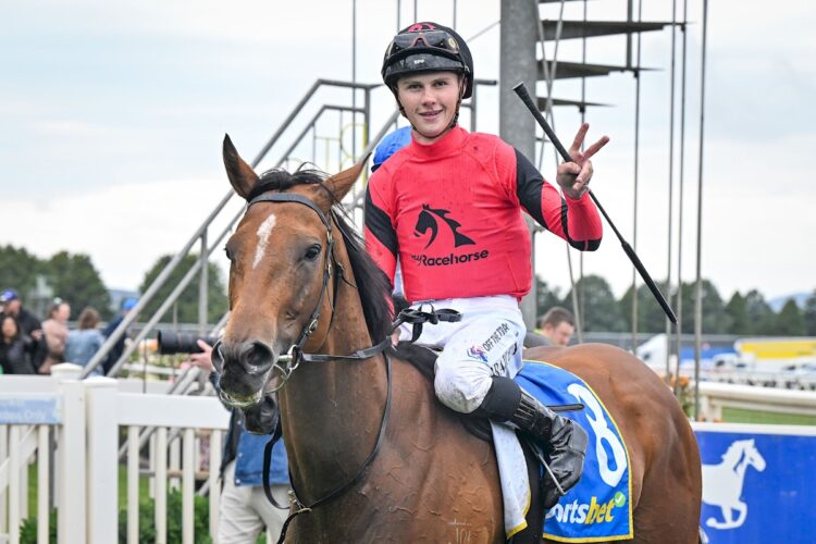 Jackson Radley returns to the mounting yard on Sneaky Sunrise after winning the Ritchie's IGA Handicap at Sportsbet-Ballarat Racecourse on December 06, 2025 in Ballarat, Australia. (Photo by Reg Ryan/Racing Photos)