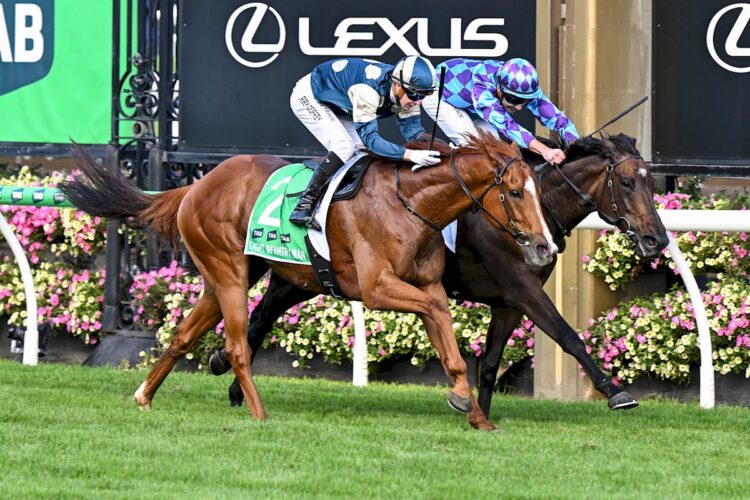 Light Infantry Man (FR) ridden by Harry Coffey wins the TAB Australian Cup at Flemington Racecourse on March 28, 2026 in Flemington, Australia. (Photo by Pat Scala/Racing Photos)