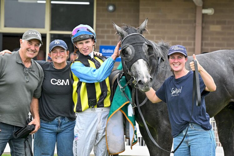 Taige Weir, fair right, with jockey Will Gotdon and connections of No Greater Vue after winning the Bakerland Maiden Plate at Colac Racecourse on March 01, 2026 in Colac, Australia. (Photo by Reg Ryan/Racing Photos)
