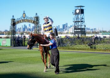Blake Shinn returns to the mounting yard aboard Nearco Frod (FR) after winning the TAB We're On at Flemington Racecourse on August 01, 2026 in Flemington, Australia. (Photo by George Sal/Racing Photos)