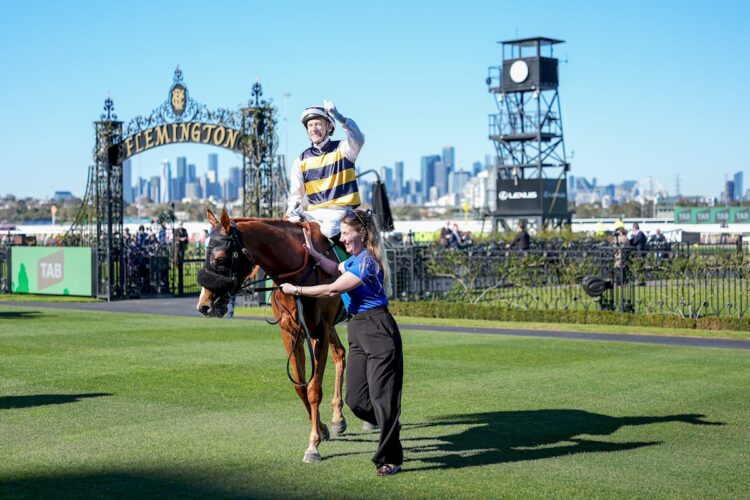Blake Shinn returns to the mounting yard aboard Nearco Frod (FR) after winning the TAB We're On at Flemington Racecourse on August 01, 2026 in Flemington, Australia. (Photo by George Sal/Racing Photos)