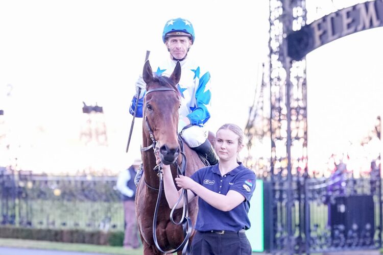 Daniel Moor returns to the mounting yard aboard Boomtown Boss after winning the Aurie's Star Handicap at Flemington Racecourse on August 01, 2026 in Flemington, Australia. (Photo by George Sal/Racing Photos)
