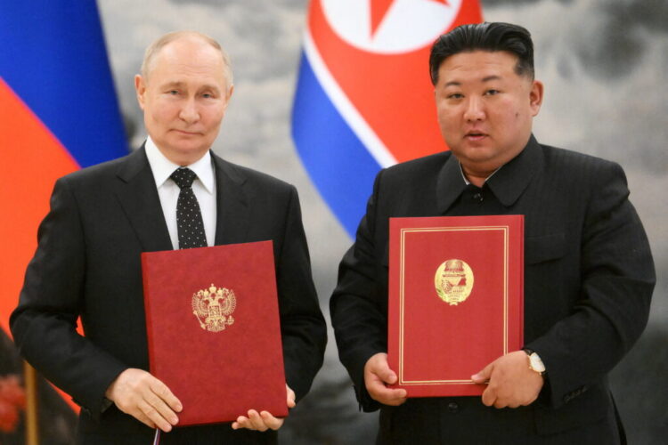 Russia's President Vladimir Putin and North Korea's leader Kim Jong Un pose for a photo during a signing ceremony following bilateral talks in Pyongyang, North Korea June 19, 2024. Sputnik/Kristina Kormilitsyna/Kremlin