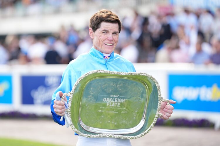 Craig Williams with the Oakleigh Plate after Tropicus after won the Sportsbet Oakleigh Plate at Caulfield Racecourse on February 21, 2026 in Caulfield, Australia. (Photo by Scott Barbour/Racing Photos)